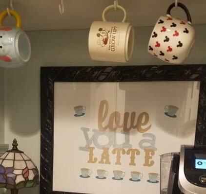 A picture frame with the words love you latte on it.