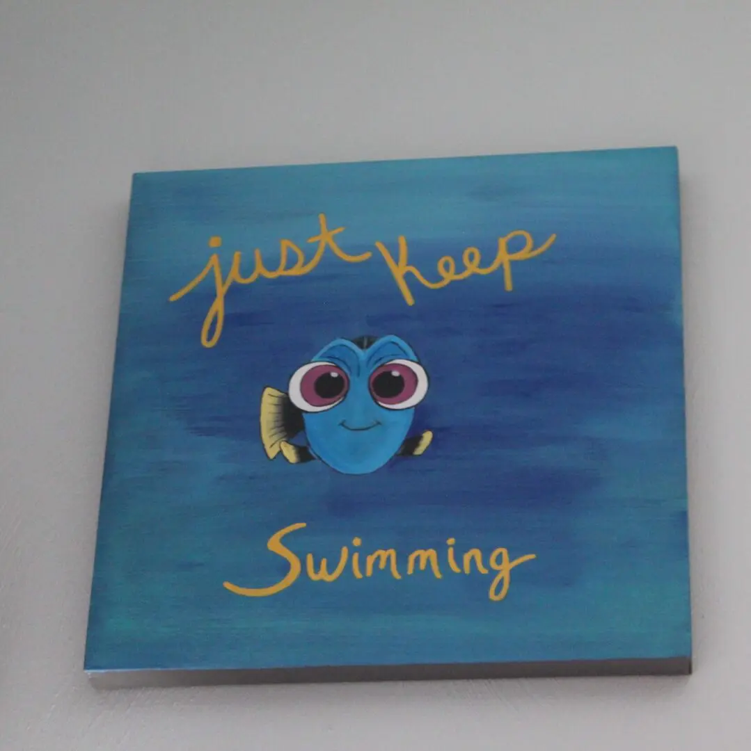 A painting of a fish on the wall